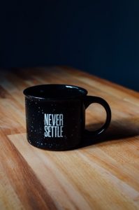 fomo fear of missing out never settle mug